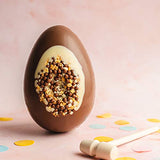 Martins Chocolatier Thick Luxury Easter Egg With Popping Candy, Honey Comb And Crisp pearls Set In A White Chocolate Halo